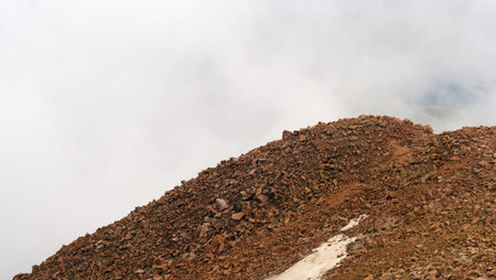 Pike's Peak in Colorado with rocks and snow.