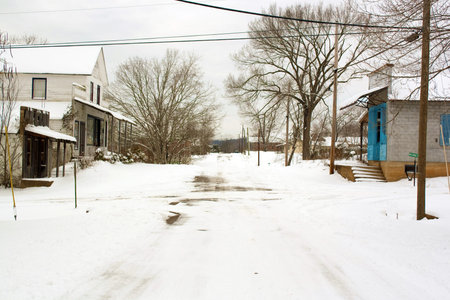 The snow covered main street in Lesterville, Missouriの写真素材