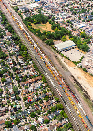 Aerial view of an urban landscape with a railyard