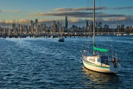 Several Boats docked in front of the Melbourne Skylineの写真素材