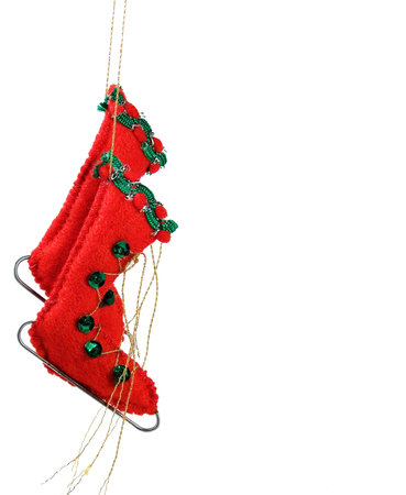 Red ice skates Christmas tree ornamentの写真素材