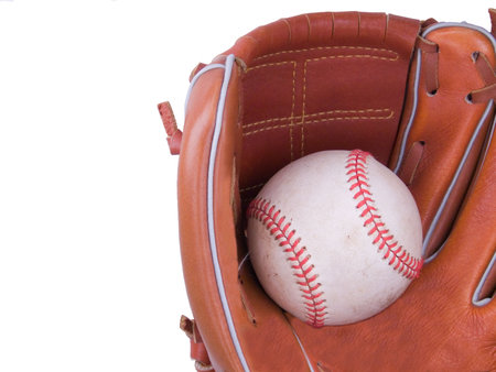 A baseball being caught in a right handed baseball glove
