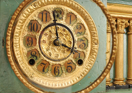 Antique Mantle clock face detail, slight oblique view.