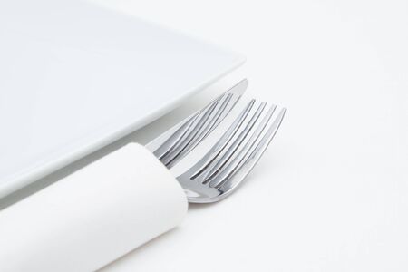 Place setting, cutlery with white napkinの写真素材