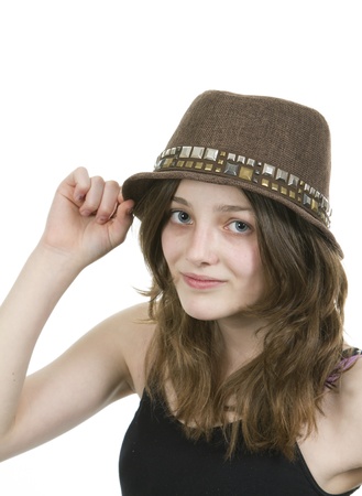 Pre teen young girl wearing a brown hatの写真素材