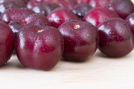 Picota cherries on wooden chopping boardの写真素材