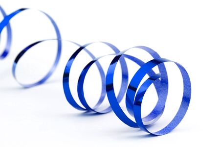 Blue christmas foil ribbon on whiteの写真素材