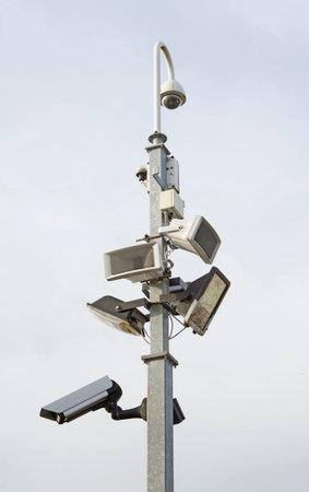 Security lights and cameras on a post