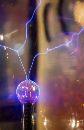 Close up centre of plasma ball emitting electric sparksの写真素材