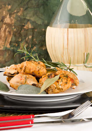 Chicken, stewed in tomato, wine and herb sauce の写真素材