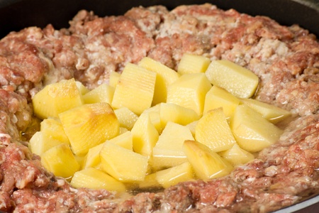 Closeup of a minced meat pie with potatoesの写真素材