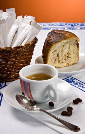 A cup of espresso coffee and a piece of cake for the morning  breakfastの写真素材