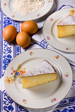 Slice of lemon cake with required ingredientsの写真素材