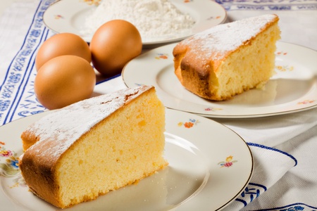 Homemade cake and required ingredients.の写真素材