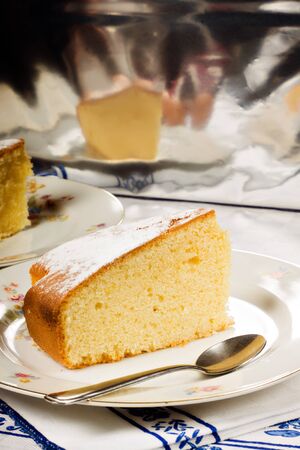 A slice of homemade lemon cake.の写真素材