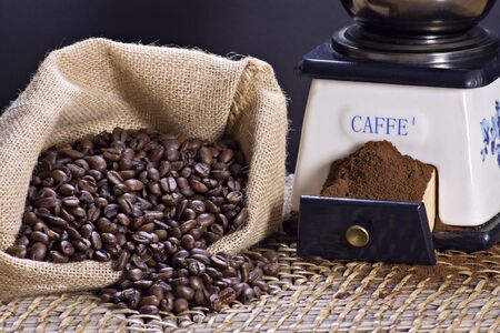 Coffee grinder and roasted coffee beans のeditorial素材
