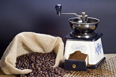 Coffee grinder and roasted coffee beansの写真素材