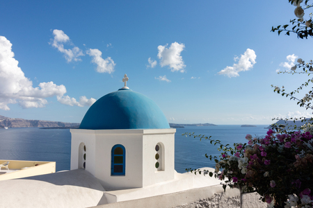 Typical blue dome of the churches in Santorini (Greeze)の写真素材