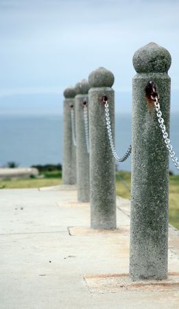 Posts with chains strung between themの写真素材