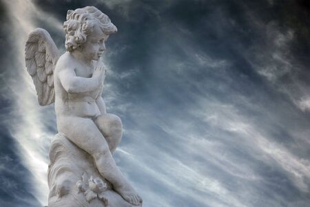 Young winged boy statueの写真素材