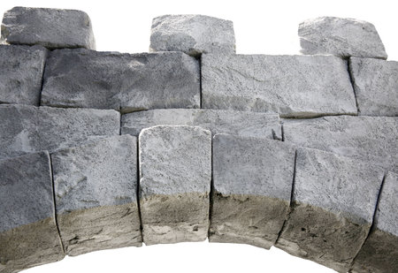 Archway made of rock blocks isolated on white