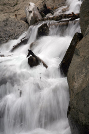 Waterfall cascading down the stream
