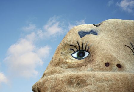 A face painted on a rockの写真素材