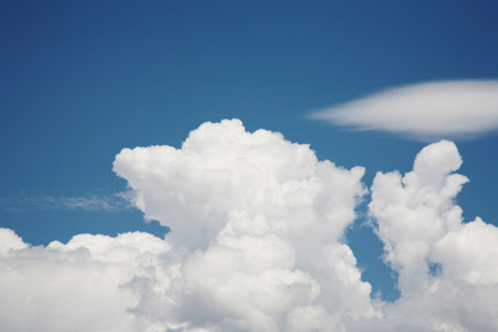 White fluffy clouds against a pretty blue sky