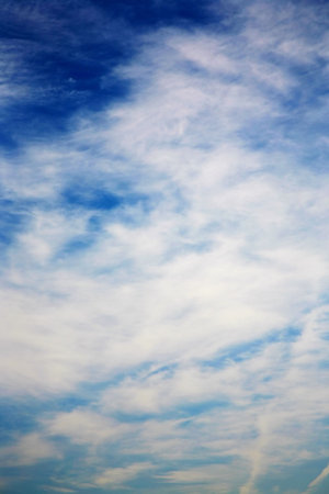 Heavenly blue cloudy sky background that is very serene