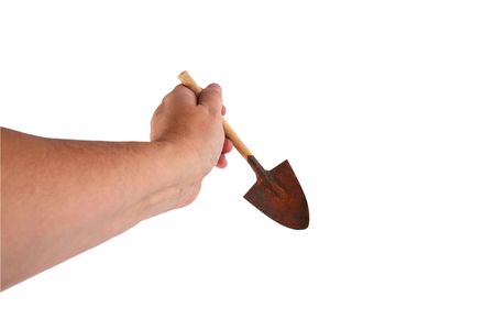 Shrinking shovel held in a hand isolated on white backgroundの写真素材
