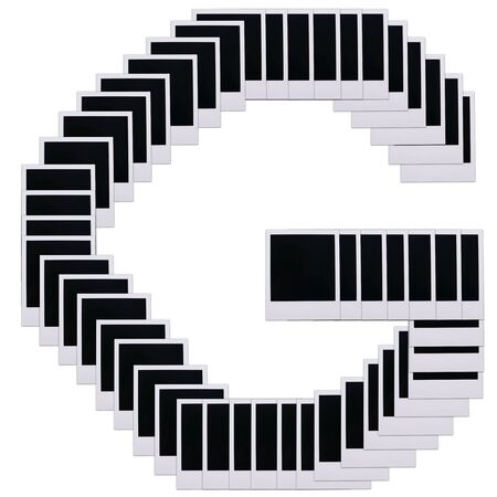 Old photo film blanks in the shape of the letter Gの写真素材