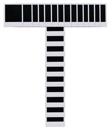 Old photo film blanks in the shape of the letter Tの写真素材