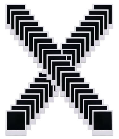 Old photo film blanks in the shape of the letter Xの写真素材