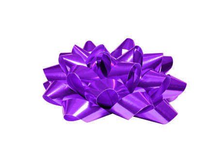 Purple bow isolated on white background, for Christmas, birthday anniversary or Valentine presentsの写真素材