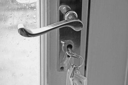 Door key and lock in black and white