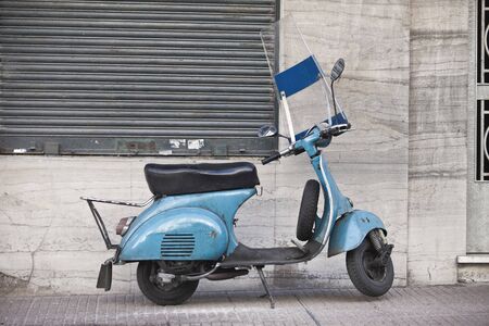 URUGUAY, MONTEVIDEO - AUGUST 5, 2014:Vintage scooter sky blue color on the streetのeditorial素材