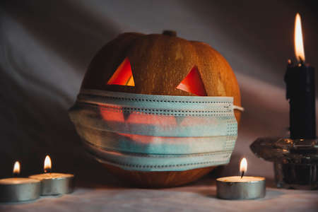 Halloween pumpkin with mask. Halloween at homeの写真素材