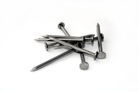 Small pile of steel nailsの写真素材
