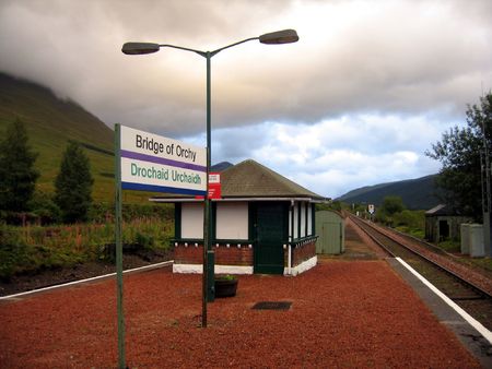 Haunting skies over platform at the Bridge of Orchy train stationの写真素材