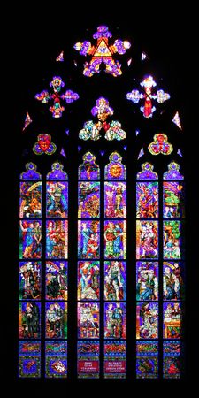 Beautiful stained glass window at St. Vitus cathedral in Pragueの写真素材