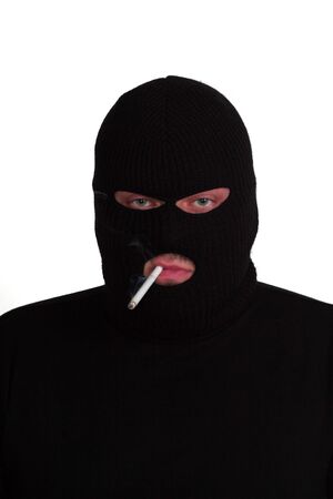 Criminal series 4 - conman smoking a cigaretteの写真素材