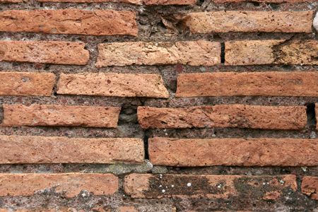Close up of Roman brick wall of Forum Romanum composed of thin clay bricks: for backgrounds and texturesの写真素材