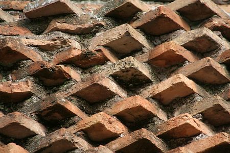 Close up of Roman brick wall of Forum Romanum composed of thin clay bricks: for backgrounds and texturesの写真素材