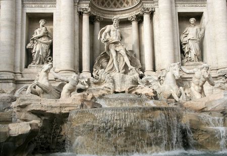 Rome's famous Trevi Fountain (Fontana di Trevi) portraying Neptune flanked by Abundance and Salubrityの写真素材