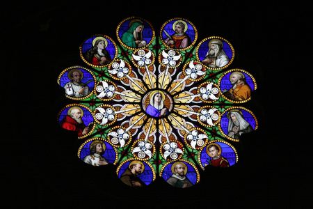 Beautiful stained glass window in church of Santa Maria Sopra Minerva in Romeの写真素材
