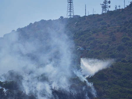 A picture of fire fighters in the skyのeditorial素材