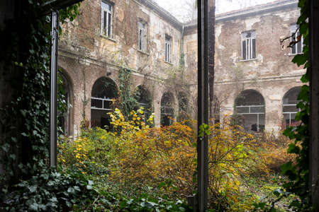 A picture of an abandoned and scary psychiatric hospitalの写真素材