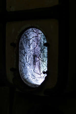 A picture of some abandoned barrels in a scary placeの写真素材