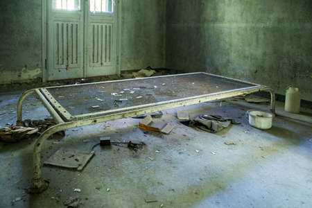 A picture of an abandoned visiting room in a psychiatric hospitalの写真素材