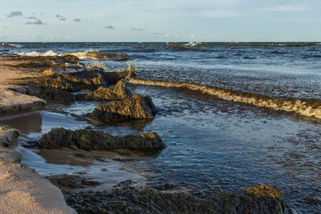 Baltic sea rocky beach view waves crossingの写真素材